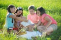 Group of children playing on grass Royalty Free Stock Photo