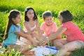 Group of children playing on grass Royalty Free Stock Photo