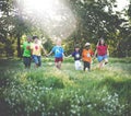 Group of Children Playing Kites Outdoors