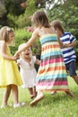 Group Of Children Playing Outdoors Together Royalty Free Stock Photo