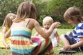 Group Of Children Playing Outdoors Together Royalty Free Stock Photo