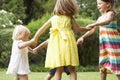 Group Of Children Playing Outdoors Together Royalty Free Stock Photo