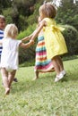 Group Of Children Playing Outdoors Together Royalty Free Stock Photo