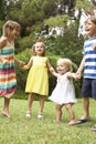 Group Of Children Playing Outdoors Together Royalty Free Stock Photo