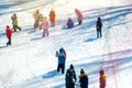 Group of children playing on snow in winter time Royalty Free Stock Photo