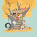 Group of Children playing in a Tree House in Autumn Park Royalty Free Stock Photo