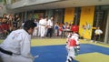 Shenzhen, China: children practicing taekwondo compete to test the effectiveness of their taekwondo lessons