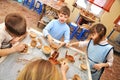 Group of children shaping clay in pottery studio Royalty Free Stock Photo