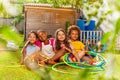 Group of children sit together with hula hoops Royalty Free Stock Photo