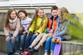 Group of children sitting on bench