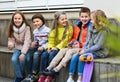 Group of children sitting on bench