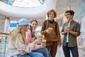 Group of children spending time together at shopping mall Royalty Free Stock Photo