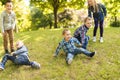 A group of children in spring field having fun Royalty Free Stock Photo