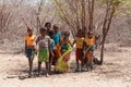 Group of children standing in a line in front of Baobab Amoureux, Morondava, Madagascar