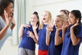 Group Of Children With Teacher Enjoying Drama Class Together Royalty Free Stock Photo