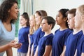 Group Of Children With Teacher Enjoying Singing Group Royalty Free Stock Photo