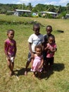 Group of children in traditional Fijian village