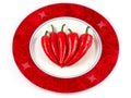 Group of chili peppers on a plate, isolated Royalty Free Stock Photo