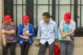 Group of Chinese tourists taking a break