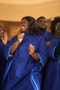 Group Of Christian Gospel Singers Praising Lord Jesus Christ. Church Filled with Spiritual Message Royalty Free Stock Photo