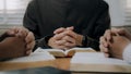 Group of christian people reading the Holy Bible to pray and worship God together in the sunday morning.spirituality, religion, Royalty Free Stock Photo