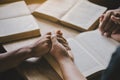 Group of christian people reading and study bible in home and pray together. Royalty Free Stock Photo