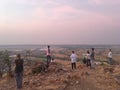 A group of Christians pray a morning prayer on a local mountain facing Tonlesap Lake, the largest freshwater lake in Southeast Asi