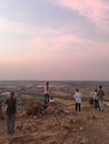 A group of Christians pray a morning prayer on a local mountain facing Tonlesap Lake, the largest freshwater lake in Southeast Asi Royalty Free Stock Photo