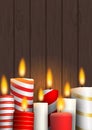 Group of Christmas burning candles on wood Royalty Free Stock Photo