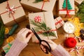Group of christmas gift boxes wrapped in kraft paper, tied with twine and decorated Royalty Free Stock Photo