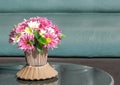 group of chrysanthemum flower pink and white blooming in ceramic vase on table. pretty gift bouquet flora blossom