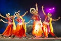 A group of Classical Odissi dancers performing Odissi Dance on stage at Konark Temple, Odisha, India. Royalty Free Stock Photo