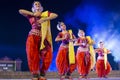 A group of Classical Odissi dancers performing Odissi Dance on stage at Konark Temple, Odisha, India. Royalty Free Stock Photo