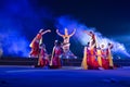 A group of Classical Odissi dancers performing Odissi Dance on stage at Konark Temple, Odisha, India. Royalty Free Stock Photo