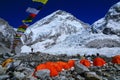 Everest climbers`tents on Khumbu glacier with prayer flags