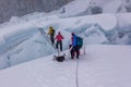 Climbers crossing a crevasse over a ladder, Island Peak, Everest Region, Nepal