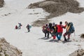 Group of climbers descending from summit