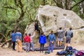 Group of climbers practicing bouldering Royalty Free Stock Photo