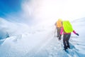 Group of climbers walking the trail in winter