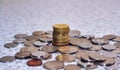 Group of coins with single stack of coins,concept photo. Royalty Free Stock Photo