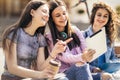 Three collage girls studying outside Royalty Free Stock Photo