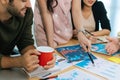 Group of colleagues young business people in smart casual working and brainstorm planning new project on desk in meeting room at m Royalty Free Stock Photo