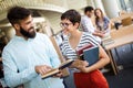 Group of college students studying at library Royalty Free Stock Photo