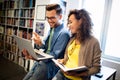 Group of college students studying in the school library. Royalty Free Stock Photo