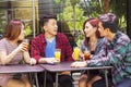 Group of college students talking in restaurant Royalty Free Stock Photo