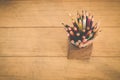 Group of color pencils in a wood cup . Royalty Free Stock Photo