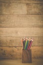 Group of color pencils in a wood cup . Royalty Free Stock Photo