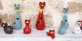 Group of colored ceramic cats