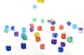 Group of colored plastic dice falling Royalty Free Stock Photo