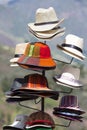 Group of colored tourist hats for sale at the market in Cusco, P